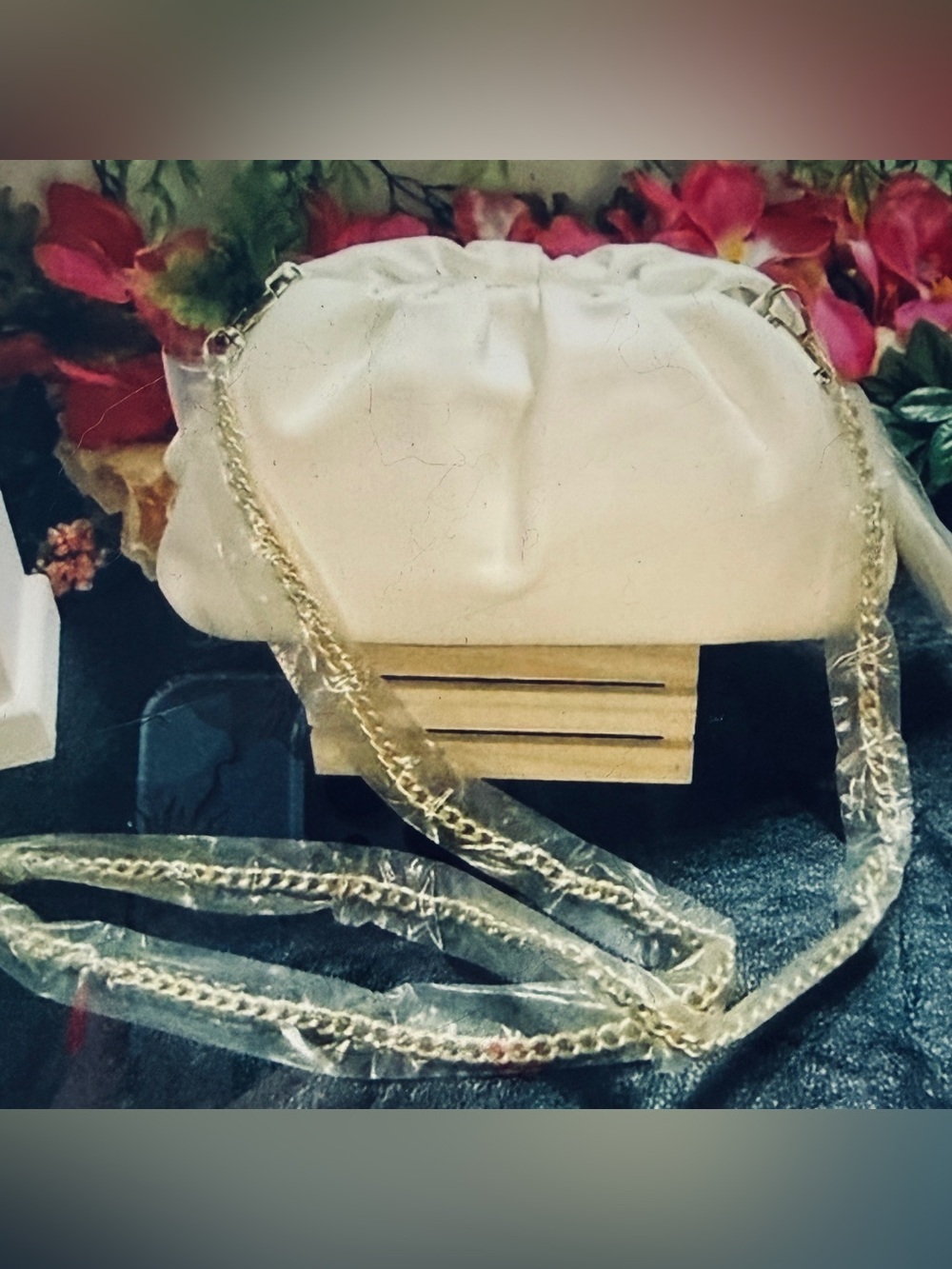 Understated Leather Ivory Crossbody bag clutch fringe charm
Printed dust bag NWT